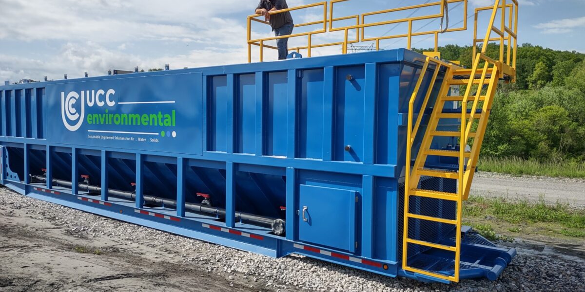 A mobile clarifier being set up on a mining site for wastewater treatment, designed to remove suspended solids and oils from process water.